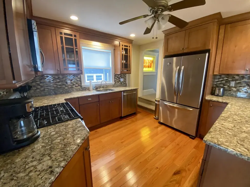 Full kitchen with granite counters
